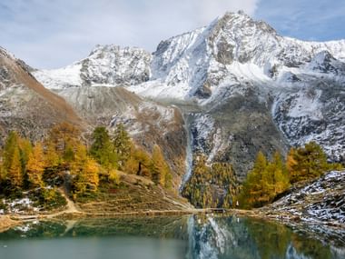 Icy mountain lake in the Val d'Hérens Icy mountain lake in the Val d'Hérens. Eurotrek-Alpin. Hiking vacations with Eurotrek.